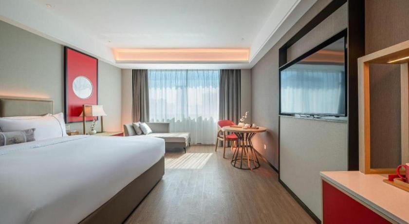 Echeng Hotel Hezhou Shizheng Square Wuzhou ภายนอก รูปภาพ